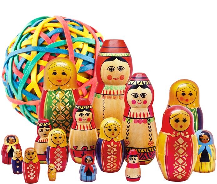 Brightly coloured Russian dolls in front of a multicoloured elastic band ball